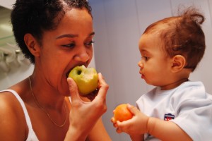 Mother child and apple