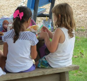 Two Girls Enjoying Lunch